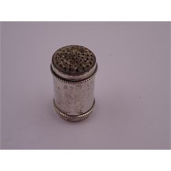 Late 19th century Dutch nutmeg grater, of plain cylindrical form with beaded rim, each end with removable silver covers with a grater to one side, with fish/dolphin mark for below 833 standard, H4.8cm