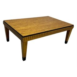 Art Deco design maple wood coffee table, rectangular top with reeded edge, on tapered supports with metal feet protectors