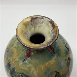 Cobridge Stoneware vase of bluster form by Andrew Hill, decorated in layered dripping blue red and brown glaze, with impressed and painted mark beneath 