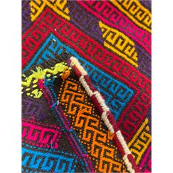 Flatweave geometric design runner rug, decorated with trailing lozenges decorated with hooked motifs, within zig-zag bands, bright multi-coloured ground 