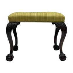 Georgian design mahogany cabriole stool, rectangular top upholstered in green fabric, on scrolled acanthus leaf carved cabriole supports with ball and claw feet