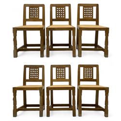 Mouseman - set of six oak dining chairs, pierced and carved lattice panel back over tan le...