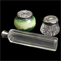 Pair of silver mounted glass scent flasks H20cm London 1916 Maker J H Worrall, Son & Co Ltd, , another matching of tapering form, a small scent flask in outer silver sleeve Birmingham 1902 and various silver mounted glass scent flasks, vases etc  (11)