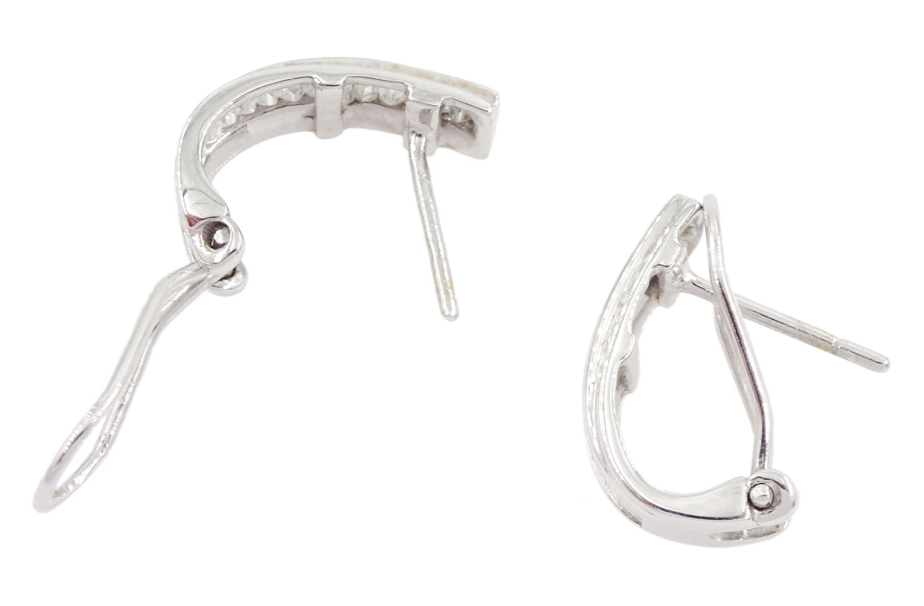 Pair of 18ct white gold channel set, baguette cut diamond half hoop earrings, total diamond weight approx 0.50 carat