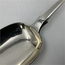 George III Exeter silver Fiddle pattern serving spoon, the terminal engraved with crest of a fist holding an arrow, hallmarked George Turner, Exeter 1816, L29cm