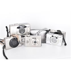 Eight Canon compact Ixus cameras, to include two Ixus examples serial nos. 2309147 & 2273184, Ixus M-1 serial no. 2932566, Ixus L-1 serial no. 2161988, Ixus Z90 serial no. 2201833,  Ixus X-1 serial no. 4704380, Z60IX serial no. 7474817, Ixus V2 serial no. 4431003237 and a Canon Powershot 350 digital camera serial no. H7MX00941