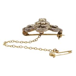 Victorian gold and silver old cut diamond stylised flower brooch, the central diamond cluster, with old cut with swirled petals 