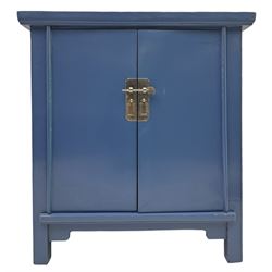 20th century Chinese blue lacquered cabinet, rectangular top over double doors with brass latch, interior fitted with shelves, on square supports