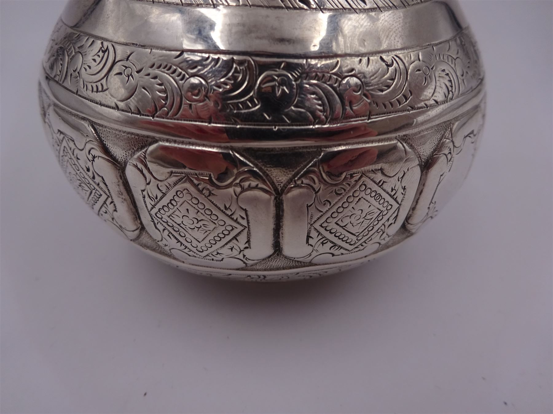 Arts and Crafts silver jug, of bellied form with C handle, the body engraved with a band of floral panels, with engraved scrolling and foliate decoration throughout, hallmarked hallmarked Samuel Smily, Goldsmiths Alliance, London 1873, H13cm