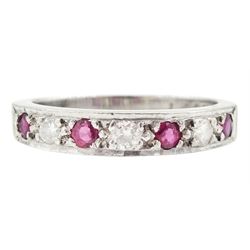 18ct white gold ruby and round brilliant cut diamond half eternity ring, London 1978