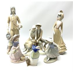A group of six Spanish porcelain figures, including Nao a girl with a cake and puppy, H20cm, Nadal girl with flowers, H22cm etc. 