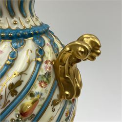 Pair of late 19th/early 20th century Sevres style vases and covers, of baluster form with gilt scroll handles and domed covers, the wrythen fluted bodies decorated with alternating bands of painted fruit and flowers and gilt vines, upon a white and celeste blue ground, with printed and impressed marks beneath, H22.5cm 