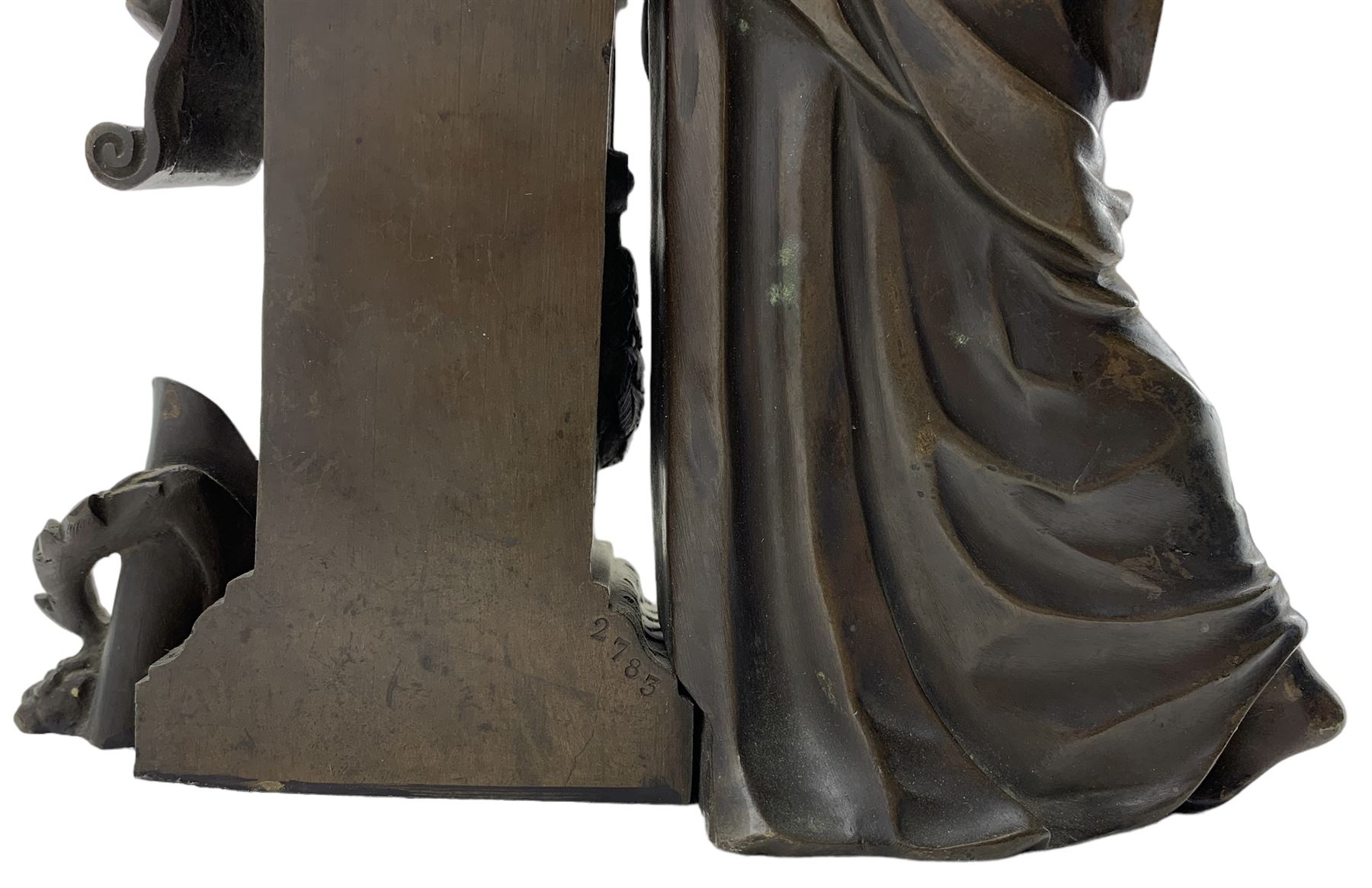 19th century French bronze sculpture of a Classical female muse leaning against a pedestal applied with a book, unsigned, numbered verso 2783, H26cm