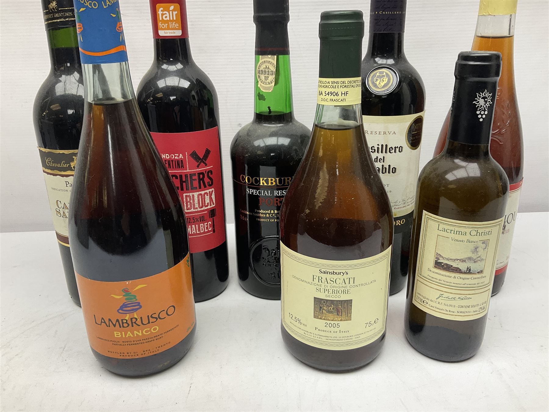 Mixed alcohol, including Cockburn's special reserve port, Casillero del Diablo Merlot, etc