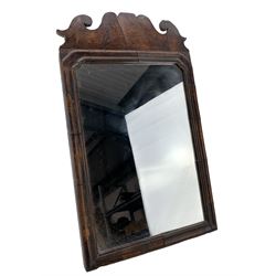 Georgian mahogany framed easel mirror of Chippendale design, the plain plate within a moulded rectangular frame