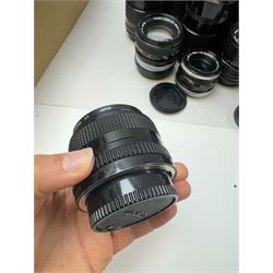 Seventeen Canon camera lenses, mostly FD examples, including 28-85mm 1:4 serial no, 49881, 35-105mm 1:3.5-4.5 serial no. 87632 and 135mm 1:2.8 serial no. 48336, one boxed