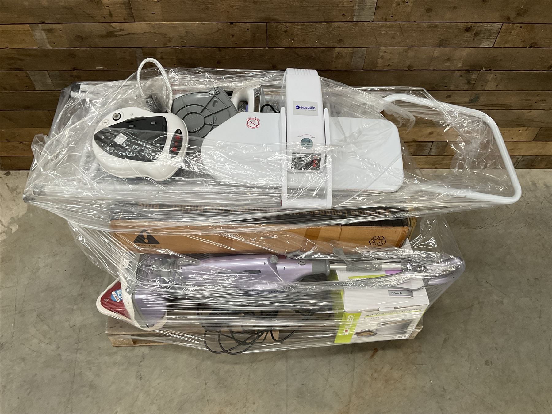 Four pallets of domestic goods to include, cleaning equipment, vacuums, exercise equipment, cooking items, Brother printer, garden loungers, irons and more… approx. 60 items