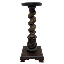 Late 19th century mahogany plant stand or torchère, circular top over barley twist column and carved acanthus base, on square plinth with bracket supports