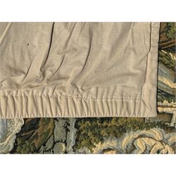 French machine woven tapestry, the scene depicting pastoral life with shepherds and sheep against a backdrop of lush foliage and classical architecture, bordered by a floral and scroll design