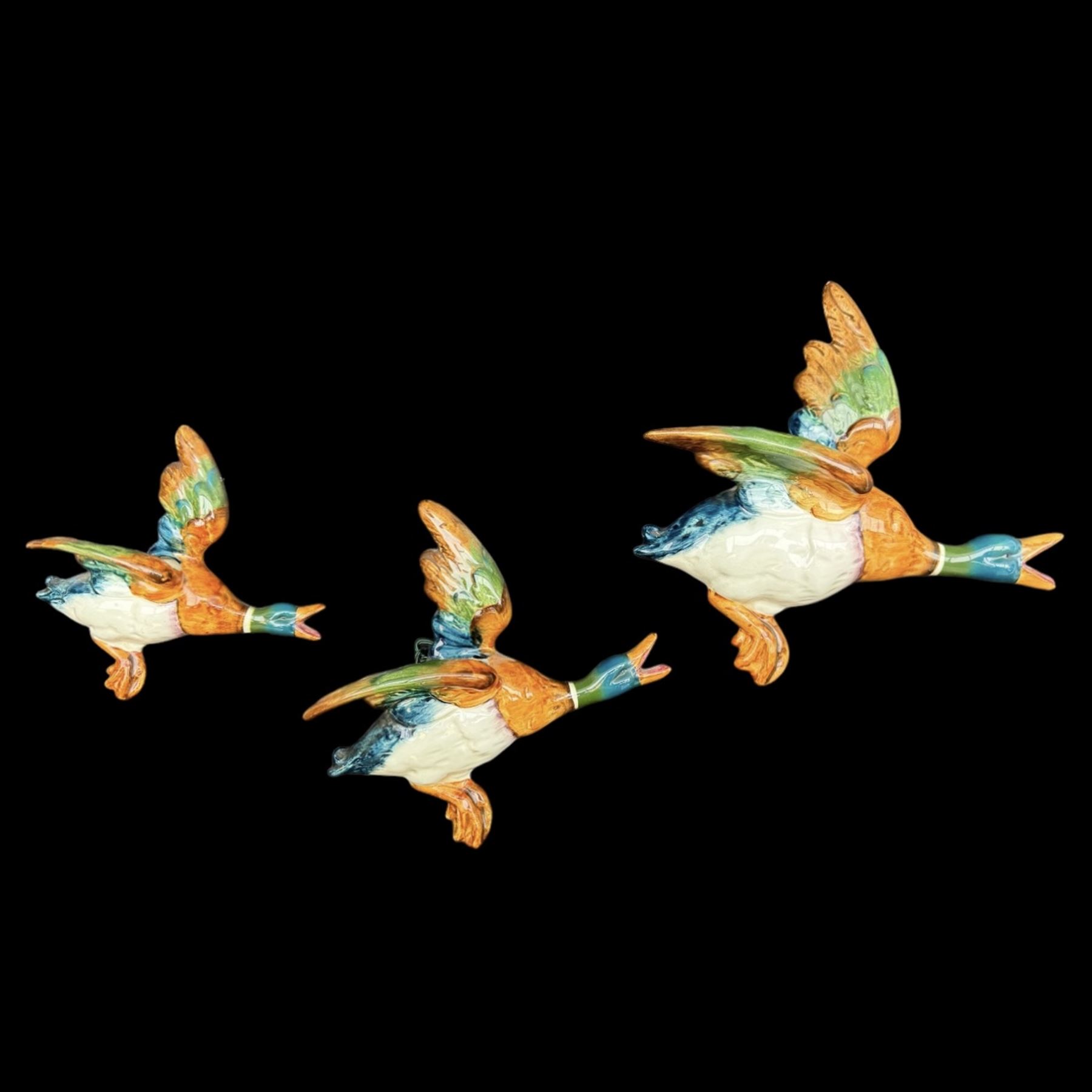 Set of three Beswick wall mounted graduated Flying Ducks, nos 596-2, 596-3, and 596-4