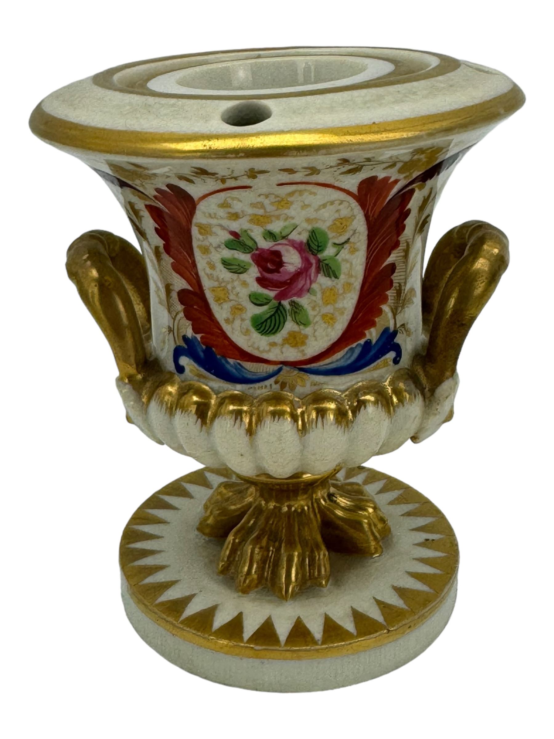 Early 19th century Derby porcelain to include a campana form inkwell, small bottle form vase, twin handled vase and flared rim vase, hand painted with a landscape scene, H10cm (4)