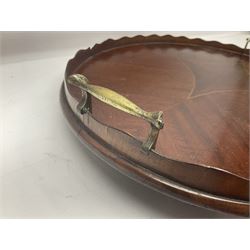 Early 20th century mahogany tray, of oval form with shaped rim and twin brass handles, with inlaid diamond decoration to centre, W67cm