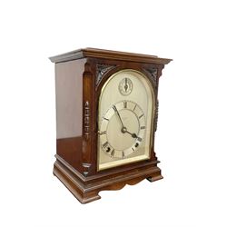 Continental early 20th century mahogany cased 8-day mantle clock, rectangular case with a flat top and fully glazed arched door to the silvered dial, separate chapter with Roman numerals, minute track and steel spade hands, subsidiary time regulation dial, with a twin train Westminster chiming movement, lever platform escapement and four gong rods. Retailed by James Ramsay, Dundee.