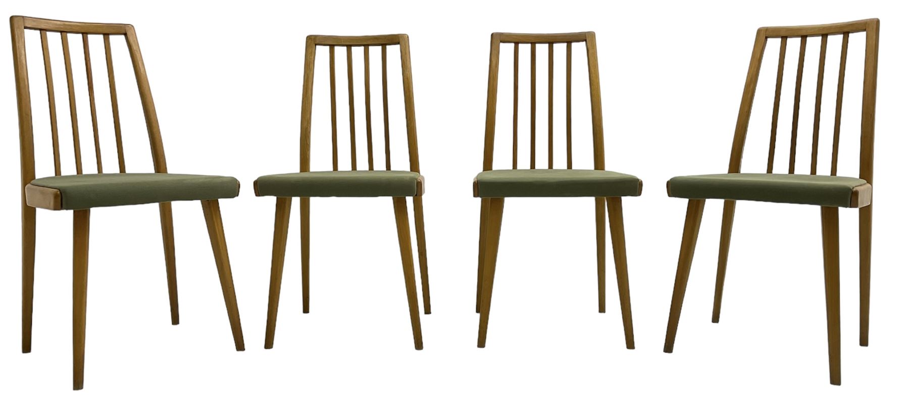 Set of four mid-20th century beech framed dining chairs, vertical slat back over upholstered seats, on tapering supports