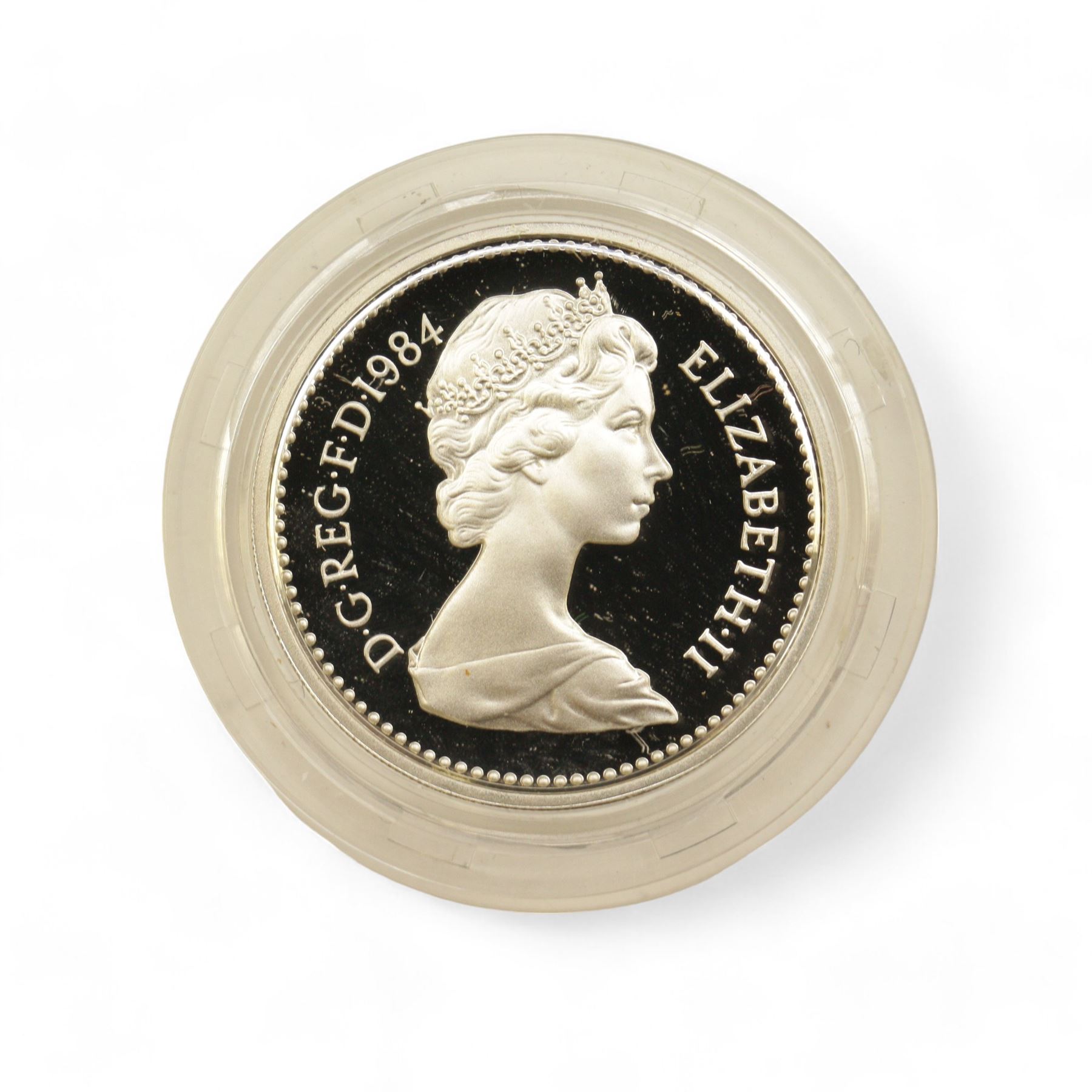 Eight The Royal Mint United Kingdom silver proof coins, comprising 1980 '80th Birthday' crown, 1981 'His Royal Highness The Prince Of Wales And Lady Diana Spencer' crown, 1984, 1985, 1986 and 1987 one pounds, all cased with certificates and a 1977 crown cased no certificate (8)