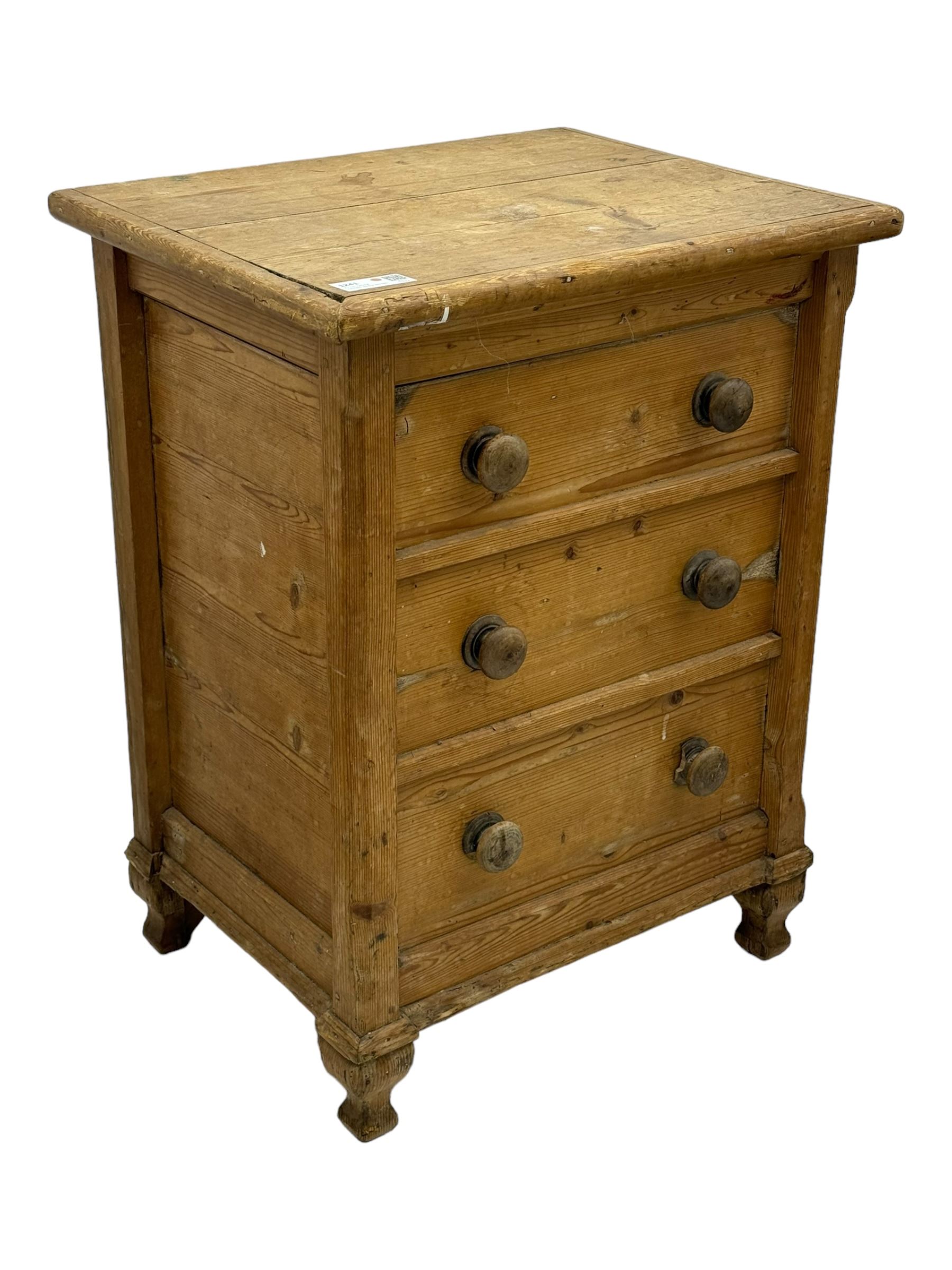 19th century stripped pine pedestal chest, hinged rectangular top with three planks and rounded edges, over three simulated drawer fronts with turned knobs, on turned baluster feet