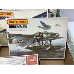 Twelve scale model kits, comprising ten model aircraft kits from Hasegawa, Nichimo, Fujimi and Matchbox, and two further Hasegawa 1:8 scale aircraft mounted machine gun kits, in two boxes 