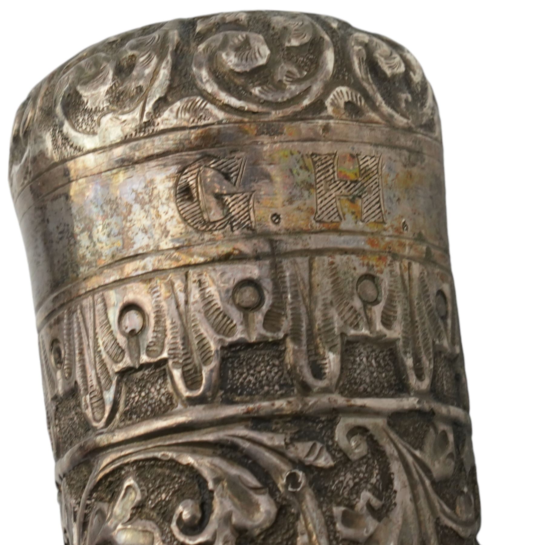 Silver stick handle of tapering form chased with leaves and scrolls and engraved 'G.H.' L36cm