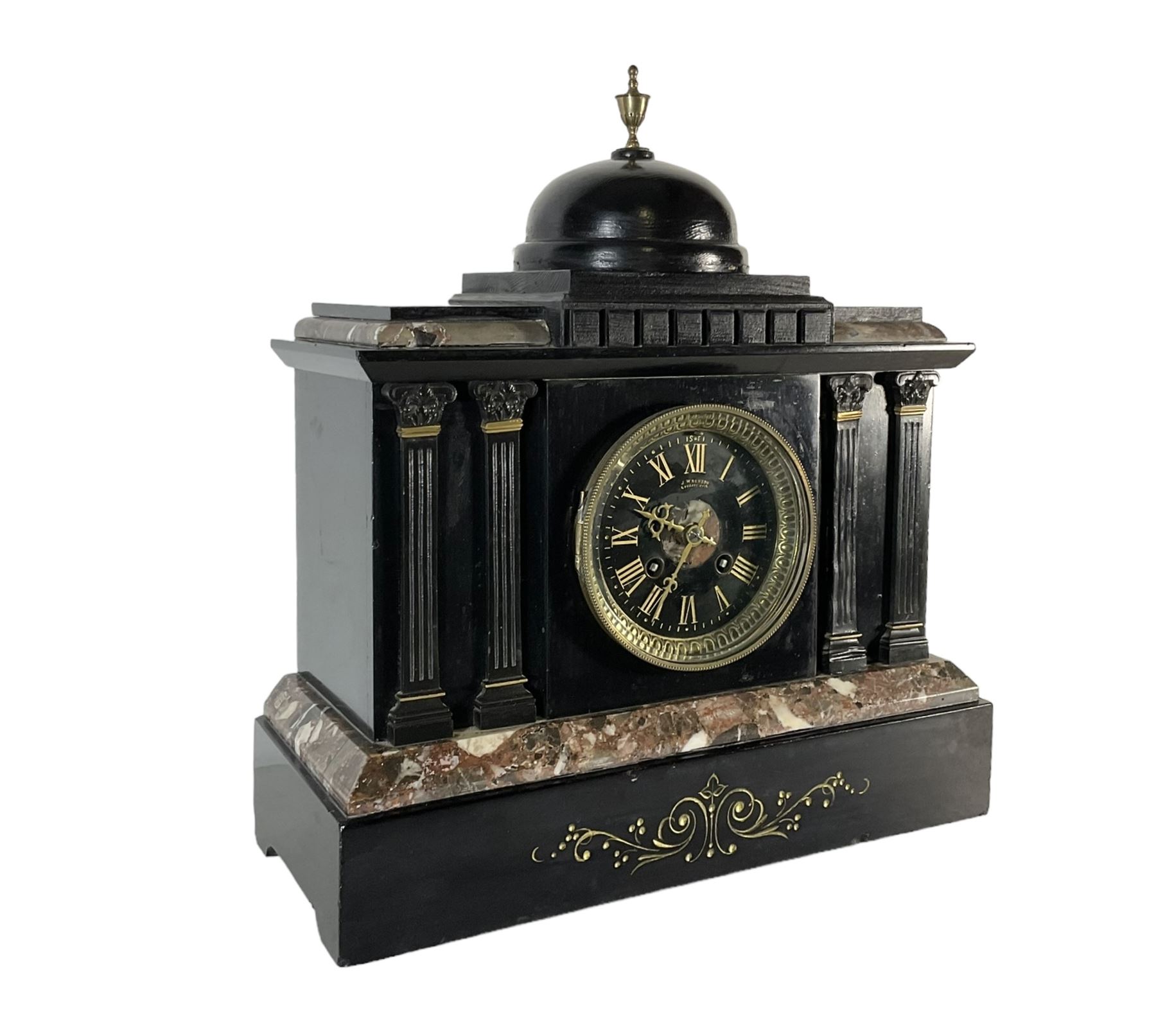 J.W. Benson of London -  8-day Belgium slate mantle clock c1880, stepped top with a central dome and brass finial, break front case with reeded columns and capitals, on a broad plinth with variegated marble and incised gilt decoration, conforming slate dial with contrasting gilt Roman numerals and brass hands, twin train striking movement, striking the hours and half-hours on a bell. With pendulum.