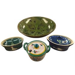 Coldstone bowl, decorated with fish on a green ground, together with three small cooking p...