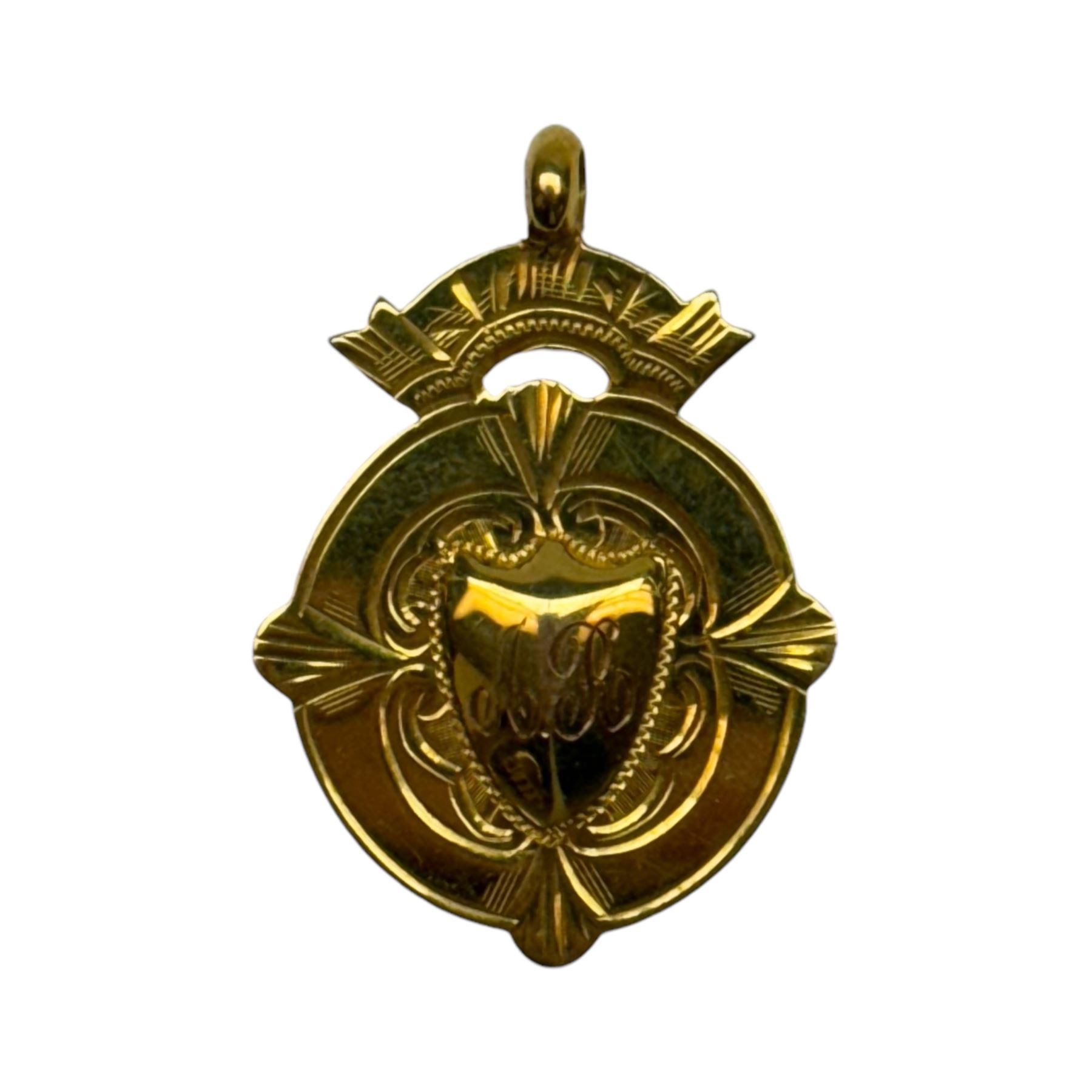 9ct gold fob medallion, the central shield shaped cartouche engraved with initials and with presentation engraving verso, hallmarked Chester 1924, H3.5cm