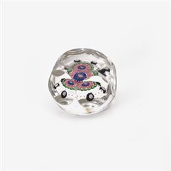 Glass Millefiori paperweight of hexagonal faceted form, H5cm