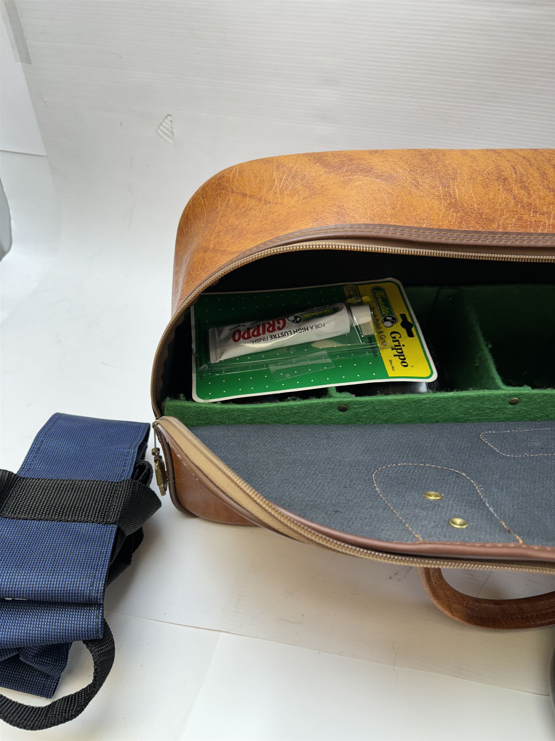 Two sets of flat green bowls, to include a ladies and gentlemans set, both contained within bowling bags