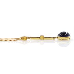 Early 20th century 14ct gold and platinum milgrain synthetic cabochon sapphire and old cut diamond pendant, on later 9ct gold trace link chain necklace