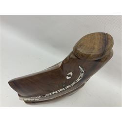 20th century Solomon Islands 'Nusu Nusu' canoe prow of typical carved form with mother of pearl inlaid detail, H29cm