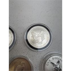 United States of America 1922 one dollar coin, two one ounce fine silver dollars dated 1992, 1996 and two Queen Elizabeth II Australia one ounce fine silver dollars dated 1994, 1995