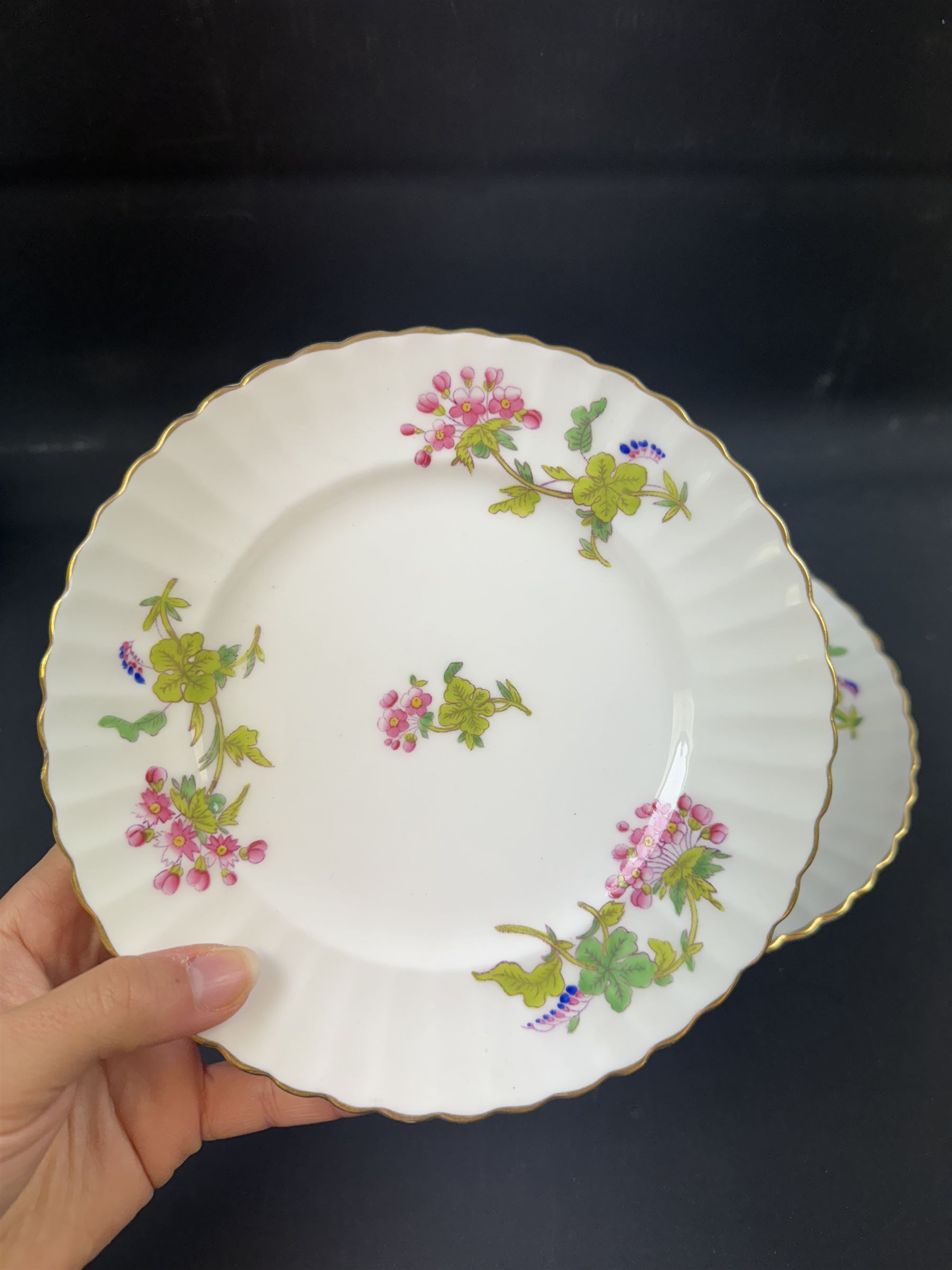 Coalport part tea service, decorated with floral sprigs, including eight cups and saucers, milk jug, eight dessert plates etc  