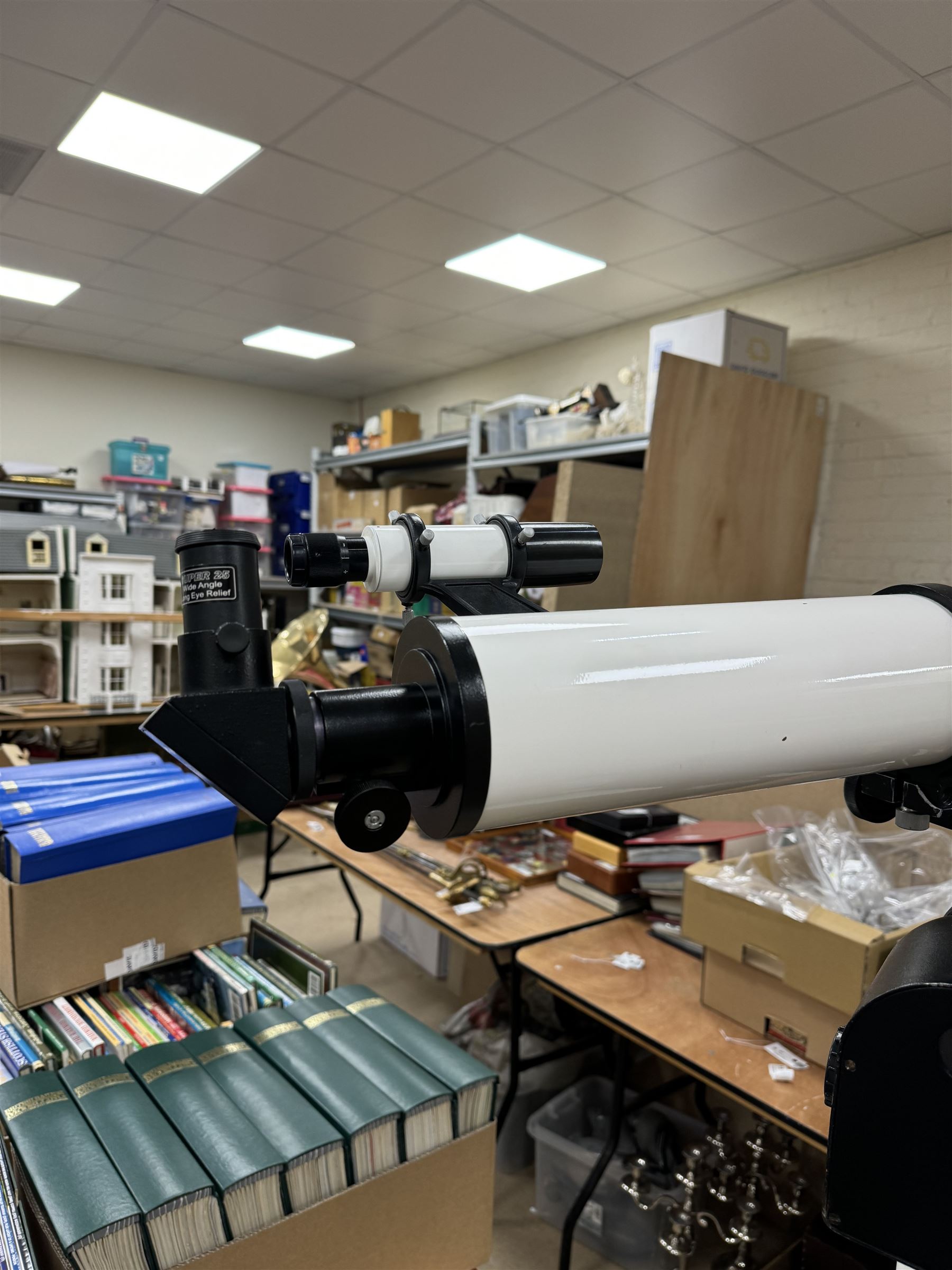 Tal-100R refractor telescope, the objective lens with dark purple coating and cylinder mounted with 6mm x 30mm finder scope, upon a pillar mount with right ascension clock drive, height when mounted H168cm, aperture 10cm, focal length 100cm 