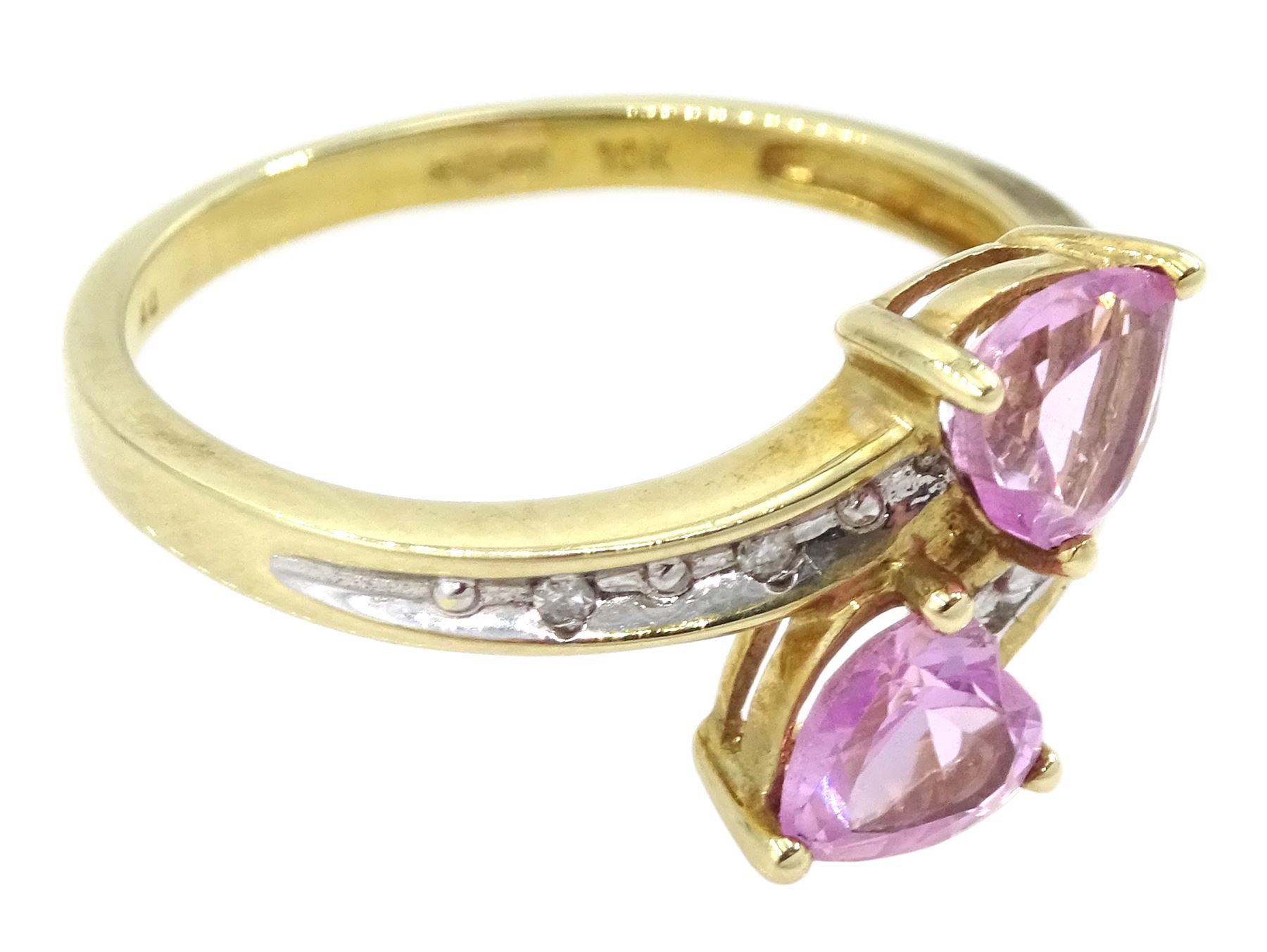 9ct gold two stone heart cut pink sapphire ring, with diamond set shoulders, hallmarked