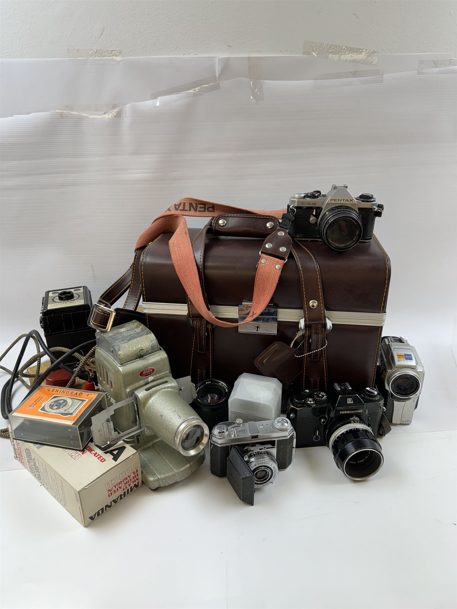 Collection of cameras and equipment, including Nikon Nikkormat camera body serial no W7543712, with 'Micro-Nikkor Auto 1:3.5 f=55mm' lens serial no 195272, Nikon F5 MF-28 Multi control Back, etc  