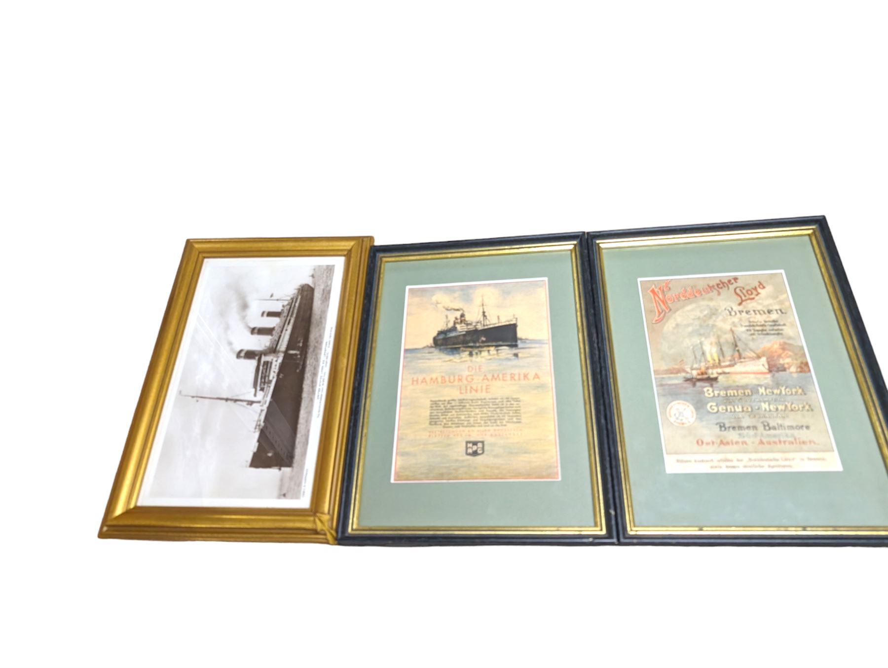 Two framed German shipping prints, together with a framed black and white postcard of United States Lines S.S. Leviathan