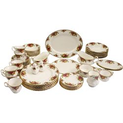 Royal Albert Old Country Roses dinner and tea ware comprising seven dinner plates, eight soup bowls, eight dessert bowls, teacups, saucers and tea plates, two sauce boats and stands, salt & pepper pots, milk jug, sugar bowl, rectangular dish, sandwich plate and oval platter 