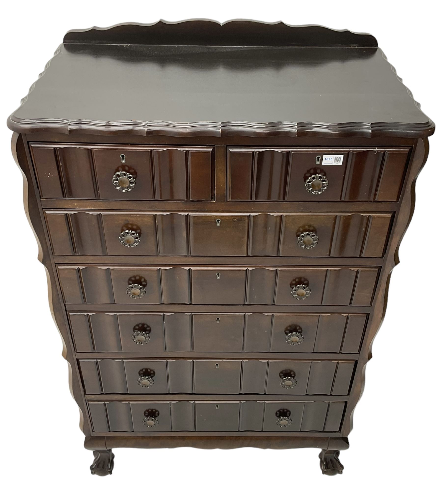 Early 20th century Dutch design mahogany chest, raised back over shaped top, fitted with two short and five long drawers, raised on ball and claw feet