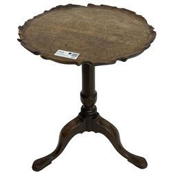 George III mahogany tripod table, circular moulded pie-crust top on turned pedestal, three splayed supports with angular spade feet