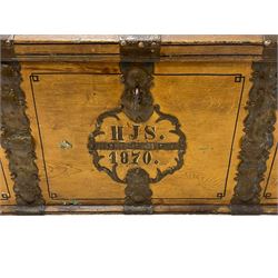 19th century painted oak sea chest, hinged dome top enclosing small compartment, bound by shaped and pressed metal strapwork, scumbled finish to resemble oak and painted with small vignettes depicting portraits and landscapes within panels, fitted with large wrought metal carrying handles, the front inscribed 'H.J.S. 1870' 
