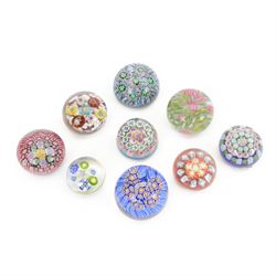 Nine miniature milleifiori paperweights including an example with twisted canes 